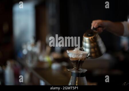 Man Has Put a Drip Coffee at Japanese style Cafe Stock Photo