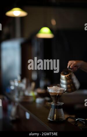 Man Has Put a Drip Coffee at Japanese style Cafe Stock Photo