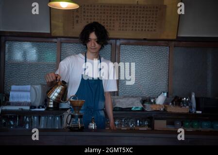 Man Has Put a Drip Coffee at Japanese style Cafe Stock Photo