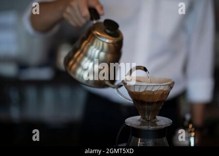 Man Has Put a Drip Coffee at Japanese style Cafe Stock Photo