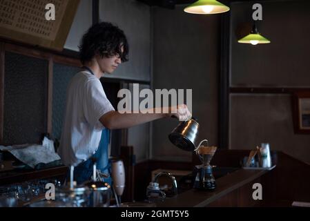 Man Has Put a Drip Coffee at Japanese style Cafe Stock Photo