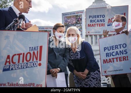 UNITED STATES - SEPTEMBER 20: From left, Senate Majority Leader Charles Schumer, D-N.Y., Rep. Nydia Velazquez, D-N.Y., Sen. Kirsten Gillibrand, D-N.Y., and Rep. Jesús âÂ€ÂœChuyâÂ€Â García, D-Ill., conduct a news conference outside the U.S. Capitol titled âÂ€ÂœTake Action for Puerto Rico,âÂ€Â on the 4th anniversary of Hurricane Maria on Monday, September 20, 2021. Photo By Tom Williams/Pool/ABACAPRESS.COM Stock Photo