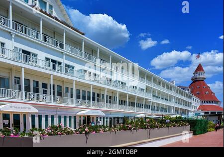 The Hotel Del Coronado with the illustrious past retains iconic Queen Anne-style architecture with red turrets since 1888 in Coronado, San Diego, CA Stock Photo
