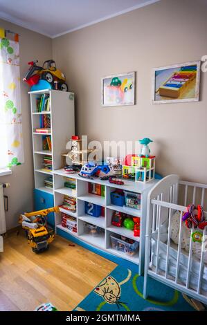 POZNAN, POLAND - Nov 12, 2018: A child's room with furniture, toys, and books in Poznan, Poland Stock Photo