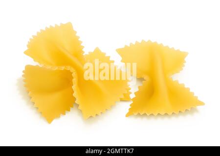 Bow tie pasta isolated on white background with clipping path and full depth of field. Stock Photo