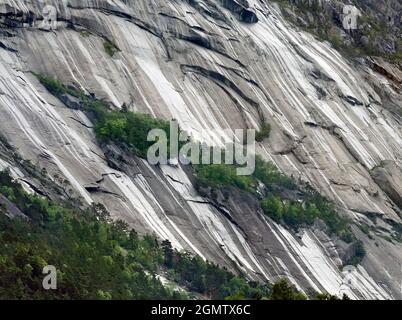 Eidfjord is a small town in Hardanger District, on the west coast of Norway. It is situated at the end of the Eidfjorden, an inner branch of the large Stock Photo