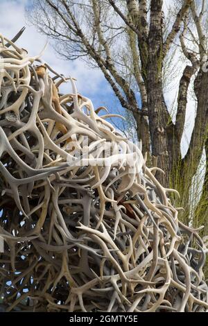 Wyoming, USA - November 2018; Now here's an unpleasant sight - an arch constructed solely out of elk horns. If my town had one of these, I'd bomb the Stock Photo