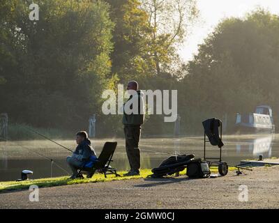 Abingdon, England - 5 September 2020; two people in view, early morning fishing.   Abingdon-on-Thames claims to be the oldest town in England. And the Stock Photo