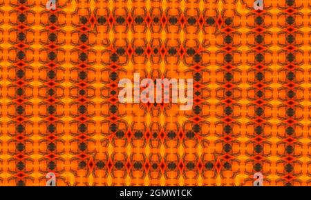 Orange polygonal kaleidoscope pattern, which consist of triangles. Geometric background in Origami style with gradient. Triangular design for your bus Stock Photo