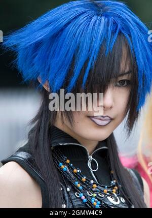 Tokyo, Japan - 6 November 2005; one girl posing in-shot Harajuku is the centre of cutting-edge street culture, cosplay and youth fashion in Tokyo. Eve Stock Photo