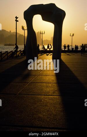 Tsimshatsui Promenade, Hong Kong - April 1985;  This public sculpture was one of several pieces of modern art by the great Sir Hentry Mooreon public d Stock Photo