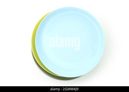 Colorful plastic plates isolated on white background Stock Photo