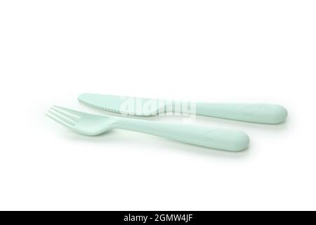Plastic fork and knife isolated on white background Stock Photo