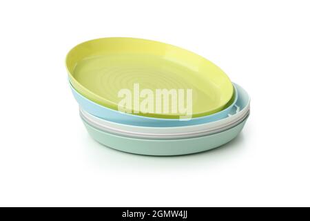 Colorful plastic plates isolated on white background Stock Photo