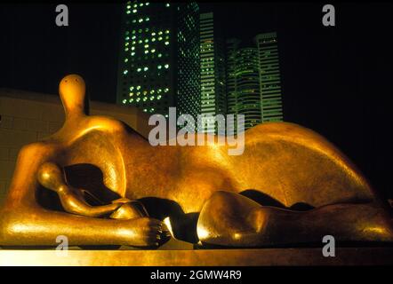 Tsimshatsui Promenade, Hong Kong - April 1985; This public sculpture 'Mother and child' was one of several pieces of modern art by the great Sir Hentr Stock Photo