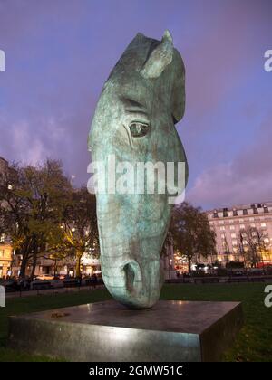 Still Water is a massive (10m) outdoor bronze sculpture of a horse's head by Nic Fiddian-Green, located at Marble Arch in London, United Kingdom. Erec Stock Photo