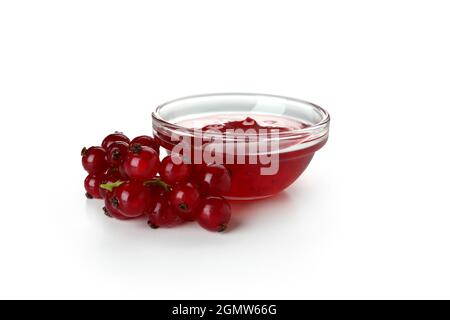 Bowl of cranberry sauce and cranberry isolated on white background Stock Photo