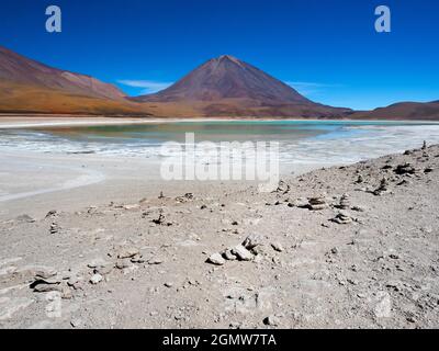 Laguna Verde, Bolivia  - 21 May 2018  Laguna Verde (green lake) is aptly named, due to its arresting jade green color. This beautiful salt lake - at 4 Stock Photo