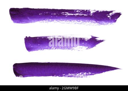 Collection of purple watercolor brush strokes isolated on a white background. Expressive ink stains. Stock Photo