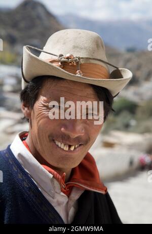 Lhasa, Tibet - 20 October 2006 An old  face that is full of character. Despite all of Tibet's travails and struggle, all the Tibetan people I met were Stock Photo