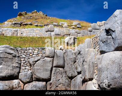 Sacsayhuaman, Peru - 15 May 2018 The ancient Inca ruins at Sacsayhuaman are located at an altitude of 3,700m overlooking the city of Cusco, the ancien Stock Photo