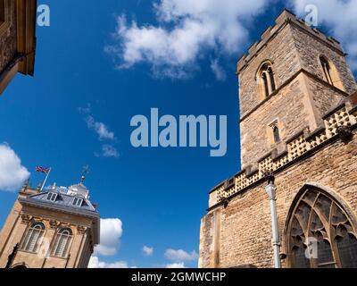 Abingdon, England - 25 August 2018      Here we see on the right one of AbingdonÕs oldest and most beautiful buildings, the County Hall - now Abingdon Stock Photo