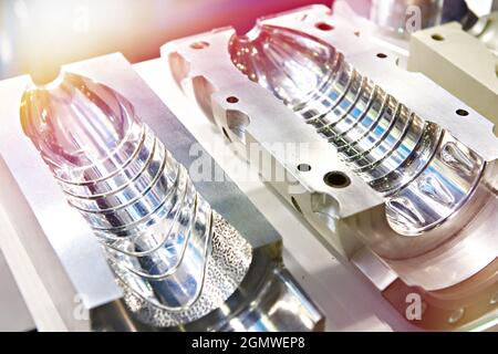 Metal molds for making plastic bottles Stock Photo