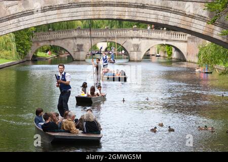 Cambridge, England - 20 July 2009; many people in view. A quintessentially English pursuit on a fine summer's day -  punting on the River Cam, which r
