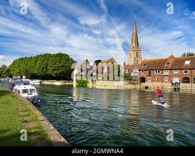 Abingdon, England - 12 July 2020; Two people in shot. Saint Helen's Wharf is a noted beauty spot on the River Thames, just upstream of the medieval br Stock Photo