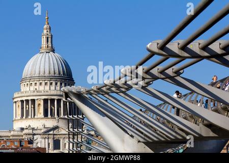 London, England - 2011; Here are two great landmarks by the Thames in London - old and new in contrast.  St Paul's Anglican Cathedral, dating from the Stock Photo