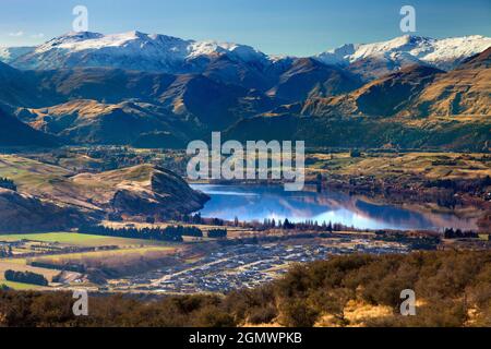 Queenstown, New Zealand - 21 May 2012 A fabulous view of Queenstown from the foothills of the Remarkables mountain range. Queenstown is a scenic resor Stock Photo