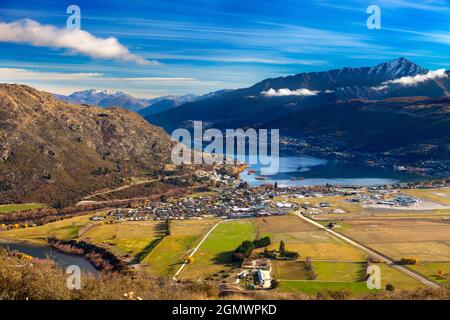 Queenstown, New Zealand - 21 May 2012 A fabulous view of Queenstown from the foothills of the Remarkables mountain range. Queenstown is a scenic resor Stock Photo