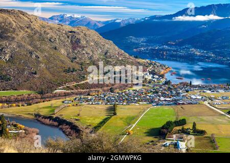 Queenstown, New Zealand - 21 May 2012 A fabulous view of Queenstown from the foothills of the Remarkables mountain range. Queenstown is a scenic resor Stock Photo