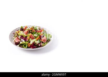 Figs salad with cheese and walnuts isolated on white background Stock Photo