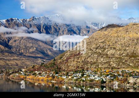 Queenstown, New Zealand - 21 May 2012 A fabulous view of Queenstown from the foothills of the Remarkables mountain range. Queenstown is a scenic resor Stock Photo