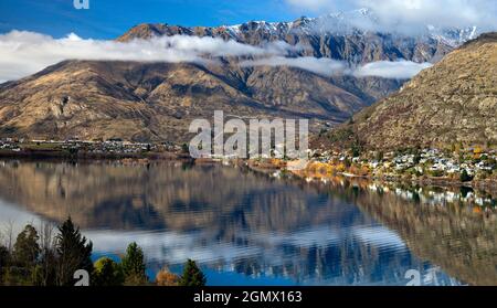 Queenstown, New Zealand - 21 May 2012 A fabulous view of Queenstown from the foothills of the Remarkables mountain range. Queenstown is a scenic resor Stock Photo