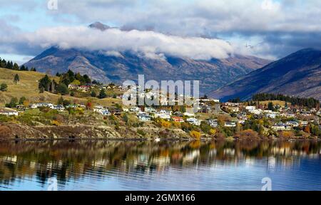 Queenstown, New Zealand - 21 May 2012 A fabulous view of Queenstown from the foothills of the Remarkables mountain range. Queenstown is a scenic resor Stock Photo