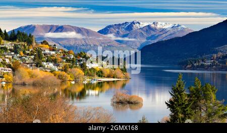 Queenstown, New Zealand - 21 May 2012 A fabulous view of Queenstown from the foothills of the Remarkables mountain range. Queenstown is a scenic resor Stock Photo