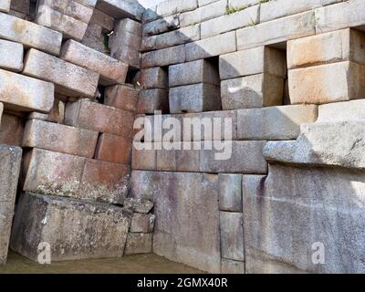 Machu Picchu, Peru - 14 May 2018 Set in an awe-inspiring mountainous location at 2400m elevation in the Andes, the ruins of the 15th Century Inca City Stock Photo