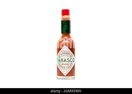 BERLIN - SEPT 18: Small bottle of Tabasco sause isolated on white in Berlin, September 18. 2021 in Germany. Tabasco is an American brand of hot sauce. Stock Photo