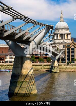 London, England - 2011; Here are two great landmarks by the Thames in London - old and new in contrast.  St Paul's Anglican Cathedral, dating from the Stock Photo