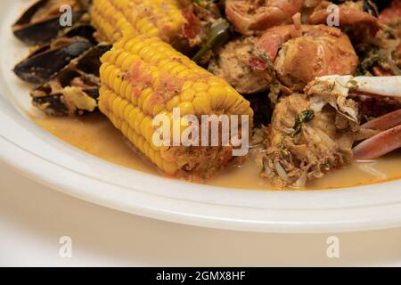 Homemade Cajun Seafood Boil with Lobster Crab and Shrimp with rice Stock Photo