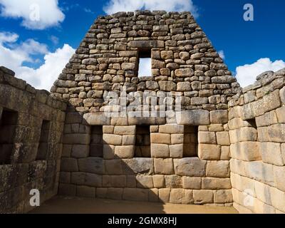 Machu Picchu, Peru - 14 May 2018 Set in an awe-inspiring mountainous location at 2400m elevation in the Andes, the ruins of the 15th Century Inca City Stock Photo