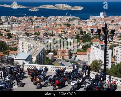 Marseilles, France - 20 June 2013; several people in view. Notre-Dame de la Garde (Our Lady of the Guard), is a Catholic basilica in Marseille, France Stock Photo