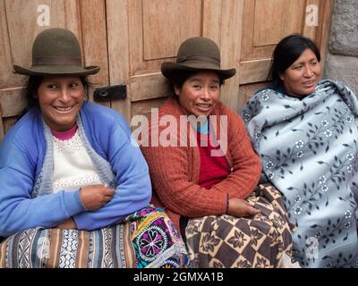 Pisac, Peru - 11 May 2018; two women in shot   Portrait of an old woman in Pisac market, close to Cusco, Peru. Like may women in the area, they wear h Stock Photo