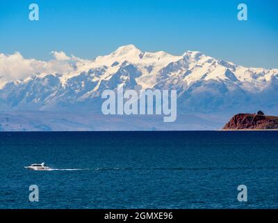 Lake Titicaca, Bolivia - 18 May 2018   A majestic view of the Bolivian Andes, seen from the Island of the Sun on Lake Titicaca. Actually, the mountain Stock Photo