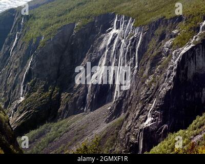 Eidfjord is a small town in Hardanger District, on the west coast of Norway. It is situated at the end of the Eidfjorden, an inner branch of the large Stock Photo