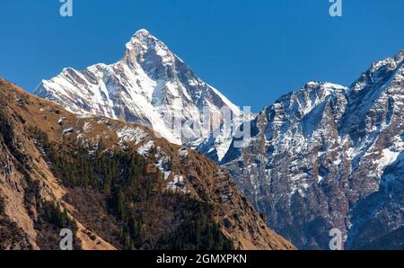 mount Nanda Devi, one of the best mounts in India Himalaya, seen from Joshimath Auli,  Uttarakhand, Indian Himalayan mountains Stock Photo