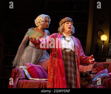 l-r: Madeleine Mantock (Elvira), Jennifer Saunders (Madame Arcati) in BLITHE SPIRIT  by Noel Coward opening at the Harold Pinter Theatre, London SW1 on 21/09/2021  a Theatre Royal Bath production  design: Anthony Ward  lighting: Howard Harrison   director: Richard Eyre Stock Photo