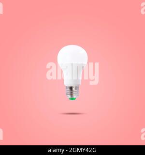 LED energy saving lamp 230v isolated on red pastel color background Stock Photo